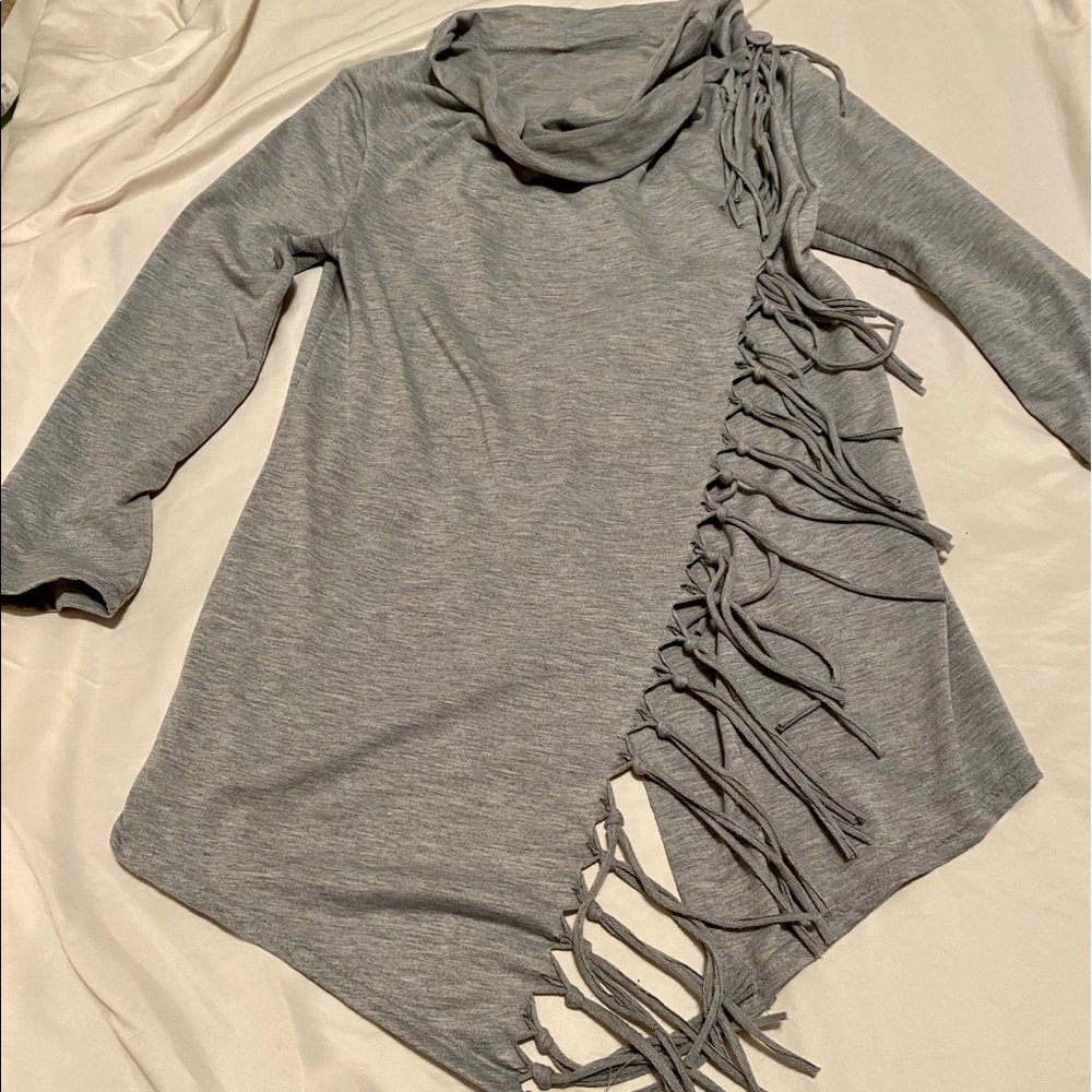 Grey sweater with tassels